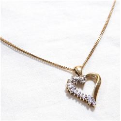 Lady's 10K Yellow Gold Diamond Heart Pendant on 18" Chain. Total weight of 4.28 grams.