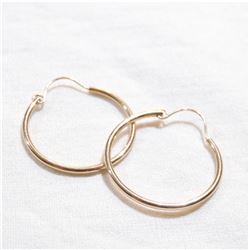 Lady's 14K Yellow Gold Hoop earrings. Total weight of .87 grams.