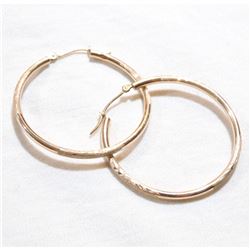 10K Yellow Gold Etched Hoop Earrings. Total weight of 1.23 grams.