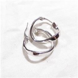 10K White Gold Lever Back Hoop Earrings. Total weight of 1.25 grams.