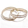 Image 1 : Lady's 10K Yellow & White Gold Aztec Design Hoop Earrings. Total weight of 7.36 grams.