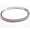 Image 1 : Lady's 18K White Gold Pave' Diamond Hinged Cuff Bracelet.  Bracelet measured 2 1/4" in diameter with