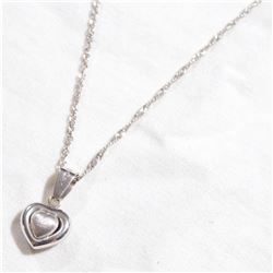 10K White Gold 3-Dimensional Heart Pendant on 18" Chain. Total weight of 3.06 grams.