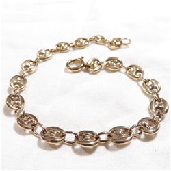 Lady's 14K Yellow Gold Solid Gucci Link Bracelet.  Measures 7 3/4" in length with a total weight of 