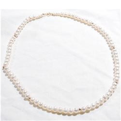 Lady's 14K Yellow Gold Pearl Necklace with Gold Beads.  Measures 18" in length.