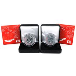 Pair of  TD  Canada trust  - Year of the Dog 1oz .999 fine silver rounds (Tax Exempt). Coins come en