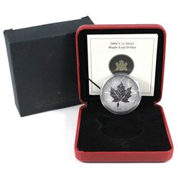 2004 Canada $5 D-day privy Mark silver maple leaf ( Tax Exempt). Coin is toned.