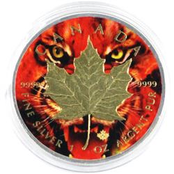 2018 Stalking Tiger Colourized & 24K Gold Plated $5 Silver Maple Leaf. Coin capsule is cracked. (Tax