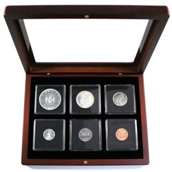 1964 Silver Proof-Like year set in mahogany finish display case.