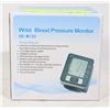 Image 1 : NEW WRIST BLOOD PRESSURE MONITOR