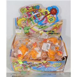 RETAIL DISPLAY OF GROWING STICKY STRETCHING MAGIC