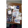 Image 2 : BAG OF CANADIAN STAMPS, INCLUDES WORLDWIDE STAMPS, COINS AND BOOKS