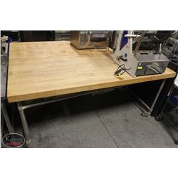 LARGE BUTCHER BLOCK TABLE ON CASTORS