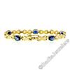 Image 5 : 14kt Yellow Gold 6.00 ctw Oval Iolite Puffed X & O Link Tennis Bracelet