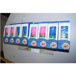 8 Pack of Candles that Rotate and Plays Happy Birthday (4 Pink, 4 Blue)
