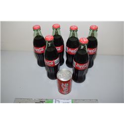 6 Coca Cola Bottles