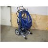 Image 4 : Graco TEX Spray Fast Finish texture sprayer  (working with hose)