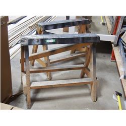 2 wooden saw horses