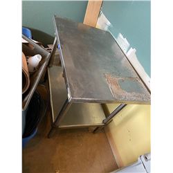 Stainless Steel Table has some bolt holes from where fry cutter was mounted