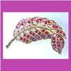 Image 2 : RED FEATHER PIN BROOCH 24K GOLD SWAROVSKI CRYSTAL