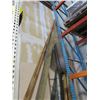 Image 2 : Mixed lot corner of warehouse.   2x3 pieces of wood, 2x12 wood, large roll of carpet, large roll of 