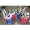 Image 1 : Four buckets of PVC Stake covers.   Some have cuts to allow tie downs to fit on the cover.