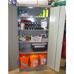 Metal Cabinet with all contents as pictured.   Misc items, carnival game parts, balls, cans, bottles
