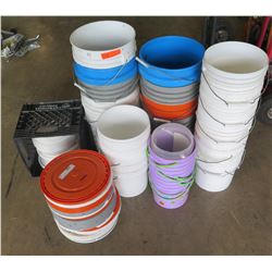 Qty 34 - Buckets.   Plastic 5 gal and 2 gal buckets.   Mixed tops.  Most tops have holes in them for