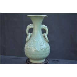 A GREEN GLAZE PEONY VASE MING DYNASTY.