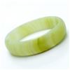 Image 1 : A NATURAL WHITE HETIAN JADE BANGLE.