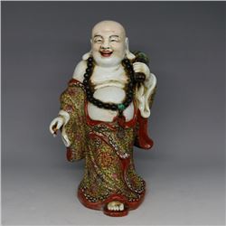 A PORCELAIN ENAMEL BUDDHA FIGURE QING DYNASTY 17TH/C.