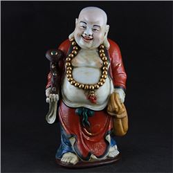 A PORCELAIN ENAMEL BUDDHA FIGURE QING DYNASTY 17TH/C.