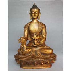 A GILT BRONZE SHAKYAMUNI BUDDHA FIGURE MING DYNASTY.