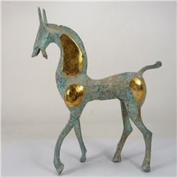 A BRONZE GILDED HORSE STATUE HAN DYNASTY 1ST/C.