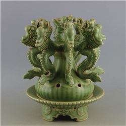 A GREEN PORCELAIN 9-DRAGON CENSER QING DYNASTY.