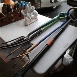 Bundle of garden tools and pitchfork