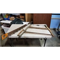 LARGE VINTAGE SAW AND WOOD BOW SAW