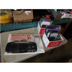 Lot of keyboards with ipad/tablet cases