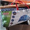 Image 4 : Coleman arrowhead 8 person tent with hockey skates, gear and backpacks