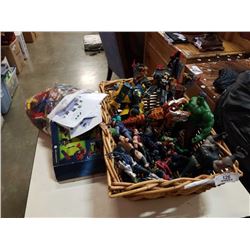 Basket of various action figures and bag of lego