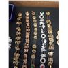 Image 2 : TRAY OF EARRINGS AND SLIDING CHARM BRACELETS