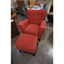 RED UPHOLSTERED ARMCHAIR WITH OTTOMAN