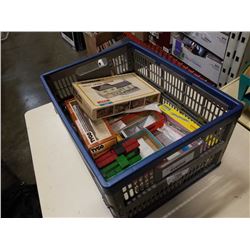 Crate of model train cars and buildings