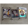 Image 1 : 3 KOBE BRYANT CARDS