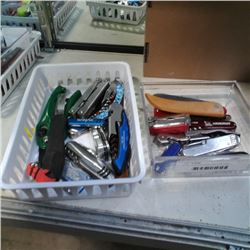 2 trays of pocket knives and multi tools