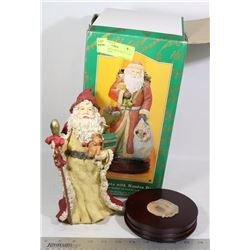 MUSICAL SANTA WITH GREEN COAT ON WOOD BASE