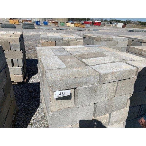 2 pallets of approx. 75 standard core concrete blocks w/ approx. 15 pavers