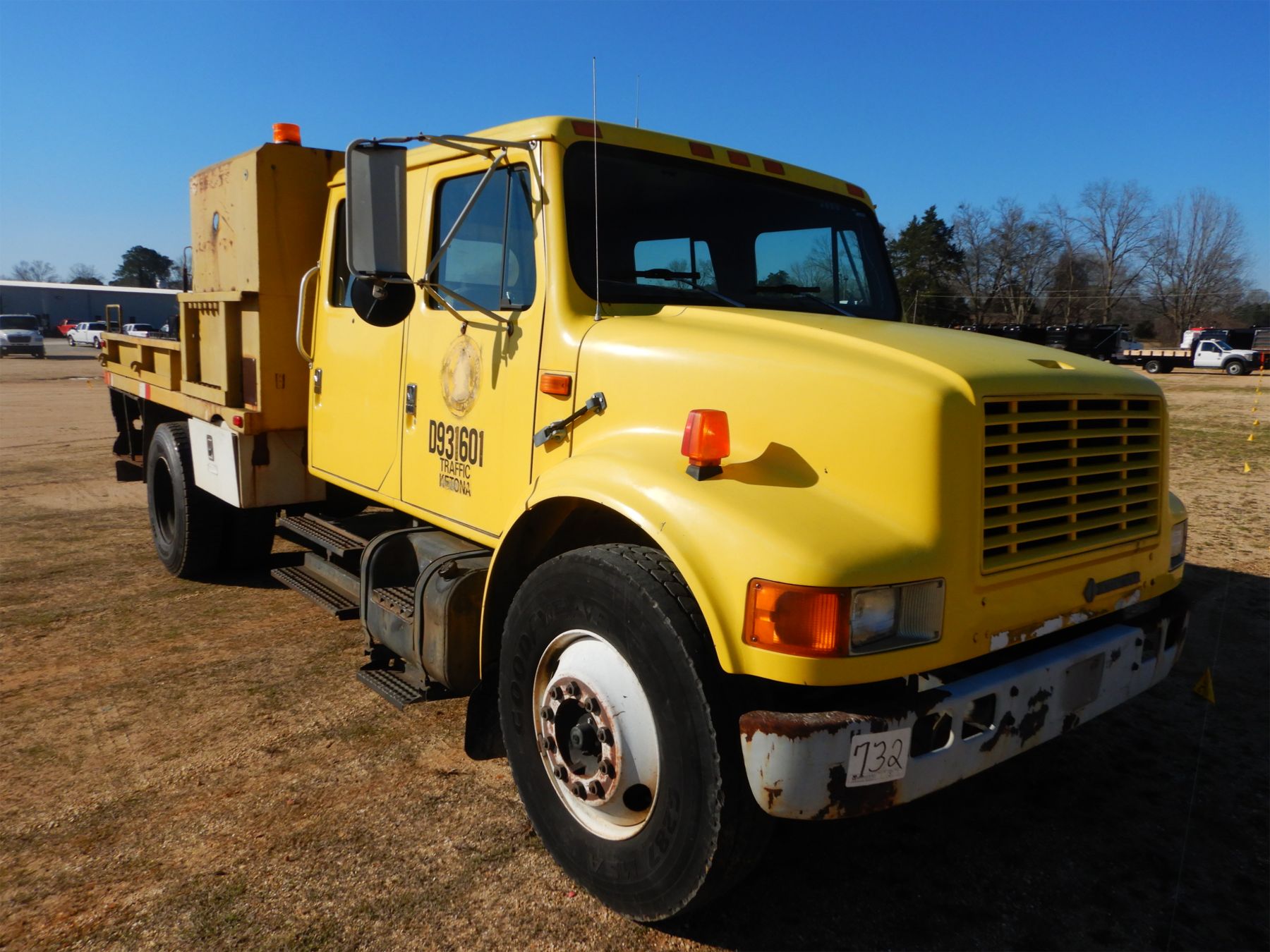 1993 INTERNATIONAL 4700 Flatbed Truck J.M. Wood Auction Company, Inc.