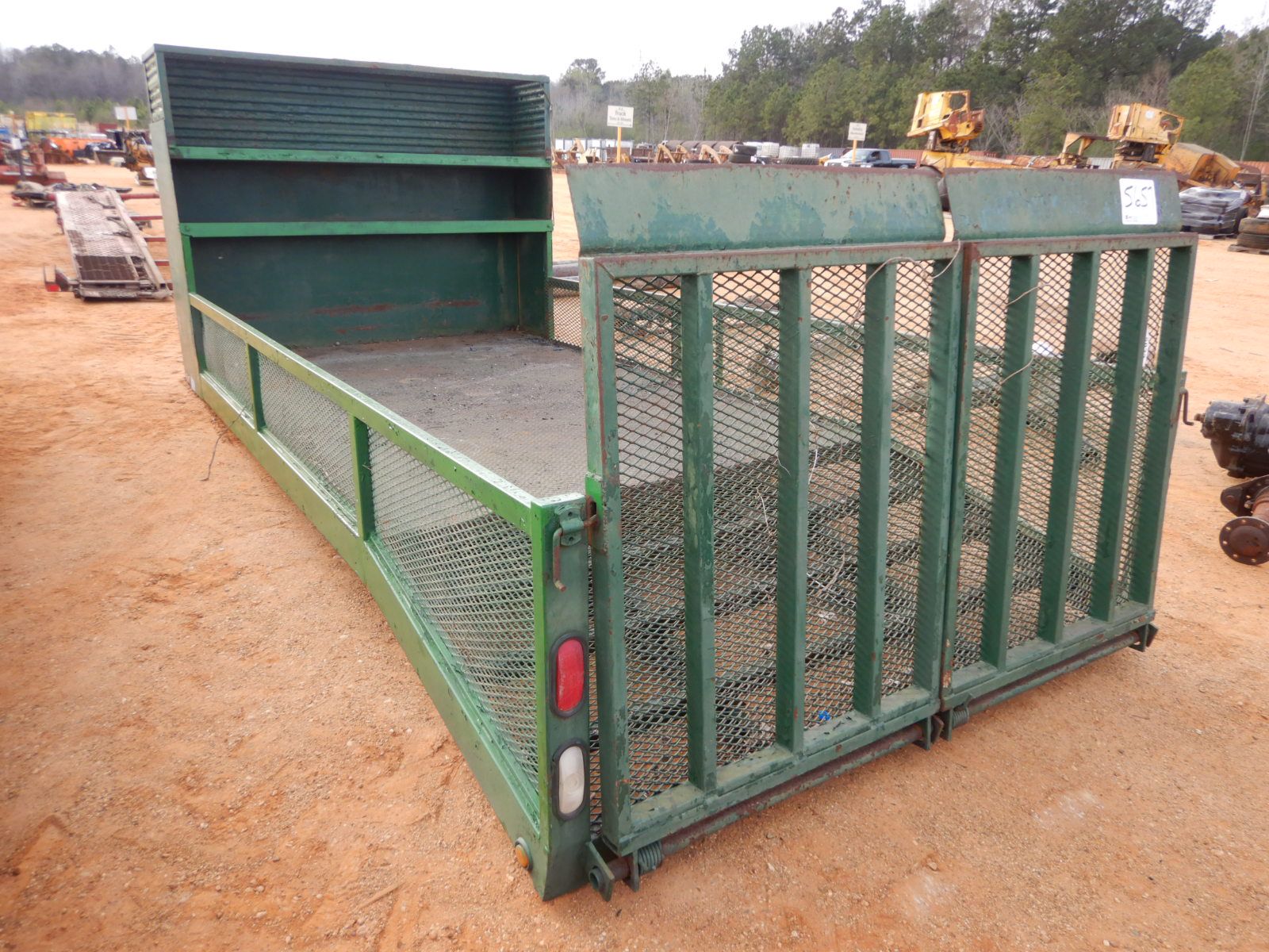 16' x 8' flatbed w/4' dovetail, fold down ramp, storage shelve, side rail