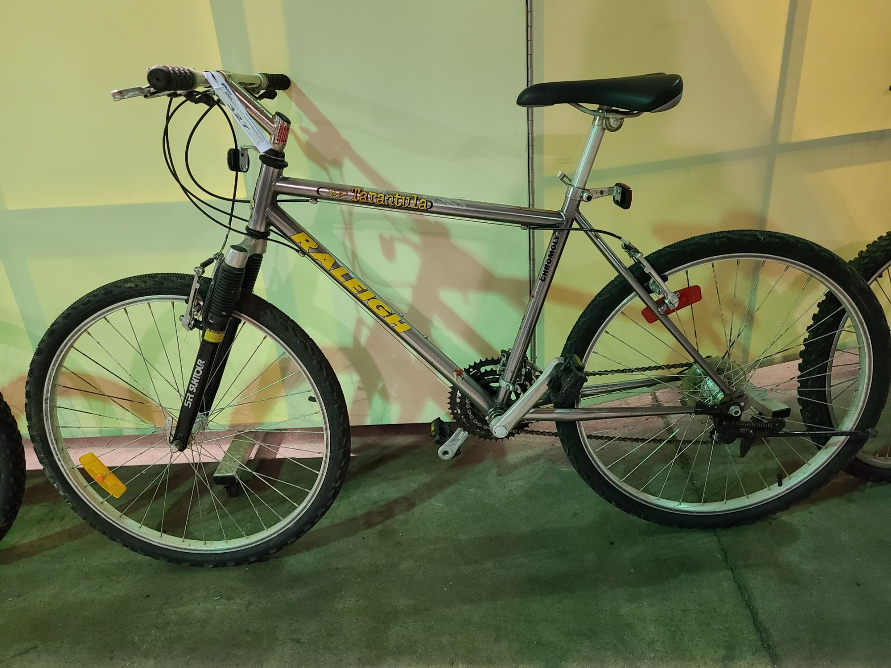 2 BIKES - SILVER RALEIGH 24 - SPEED FRONT SUSPENSION MOUNTAIN BIKE ...